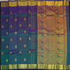 Peacock blue Kanchipuram silk saree from Vivaaha Silks budget collection featuring gold annam and chakaram butta, and a grand zari pallu with paisley and diamond motifs.