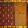 Manthulir short color Kanchipuram silk saree from Vivaaha Silks budget collection featuring golden thilagam buttas and rich zari pallu with traditional border.