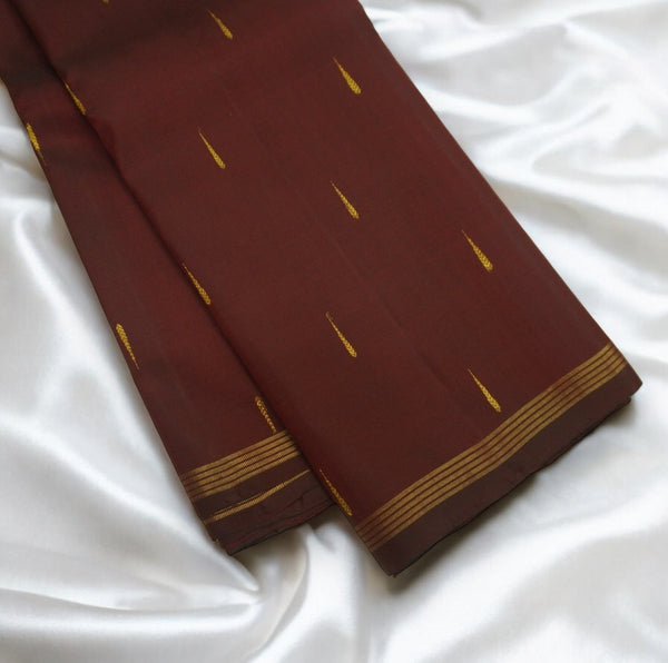 Traditional Navalpazham Kanchipuram Silk Saree with Malli Moggu Butta and Zari Line Border