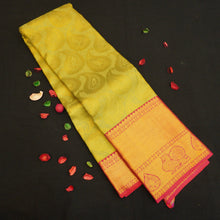 Load image into Gallery viewer, bridal kanjivaram silk saree in elaichi green with pink border handwoven with pure gold zari
