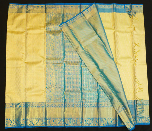 Lemon Yellow kanchipuram bridal silk saree with ananda border handwoven with pure gold zari 