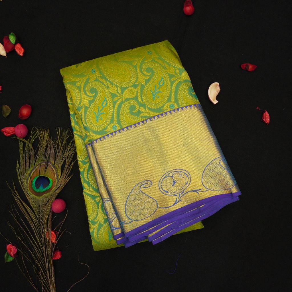 Bridal kanchipuram silk saree in pista green with contrast border
